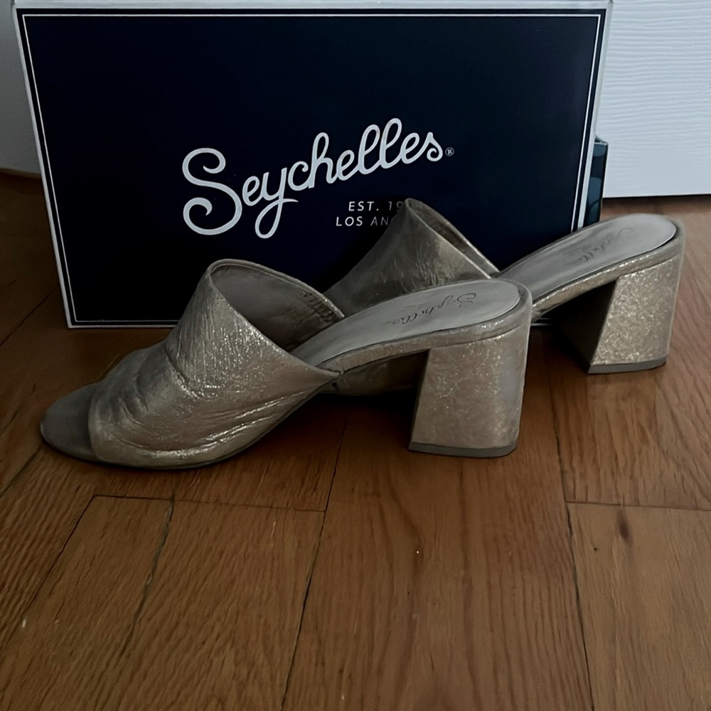 Seychelles mules in a light gold